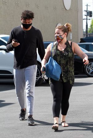 Justina Machado with Brandon Armstrong - Heads into the DWTS studio  in Los Angeles